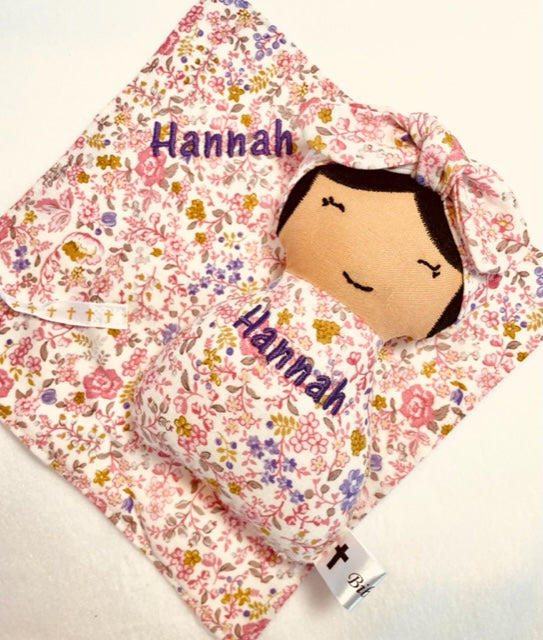 Baby Hannah and quilt.